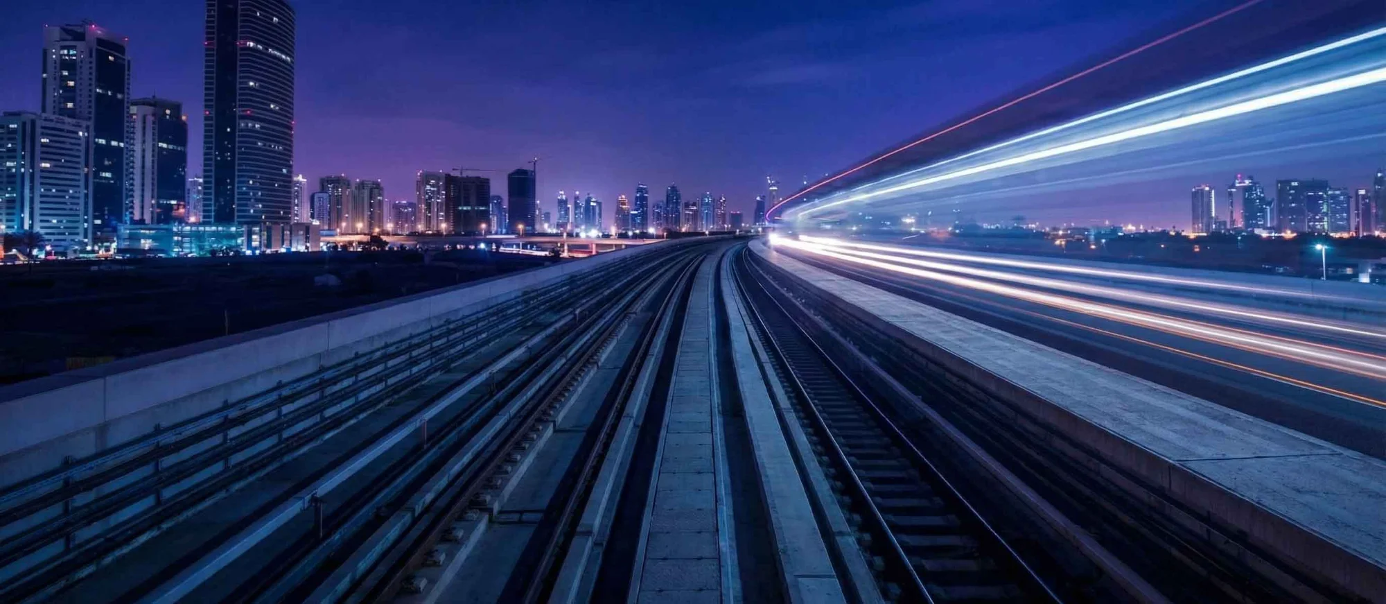 City skyline with light trails